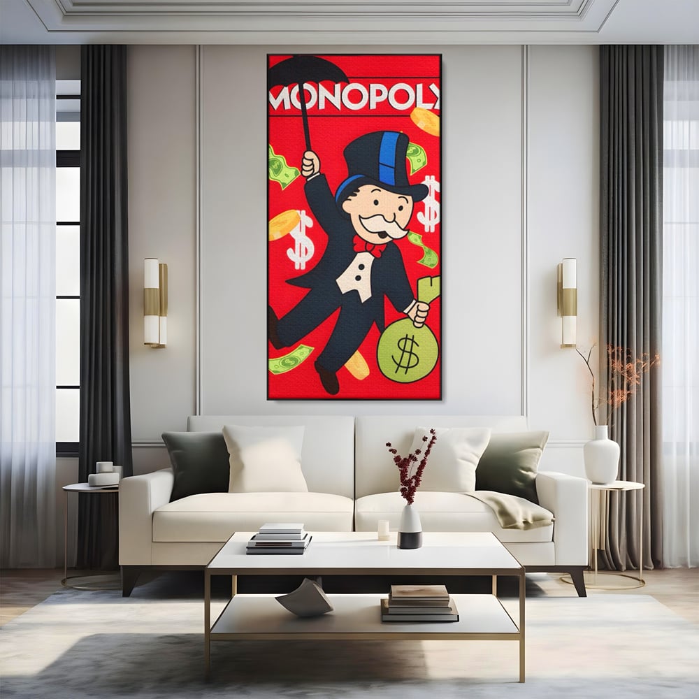 Tablou canvas cu tablou canvas cu domnul monopoly pe fond rosu, in rama de aluminiu negru, pe perete intr-un living